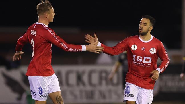 Josh Phelps and Gian Albano celebrates the latter’s goal.