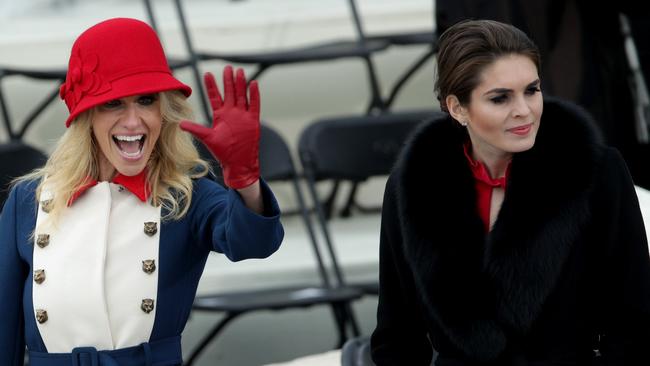 Trump advisers Kellyanne Conway, left and Hope Hicks during President Trump’s inauguration ceremony. Picture: AFP