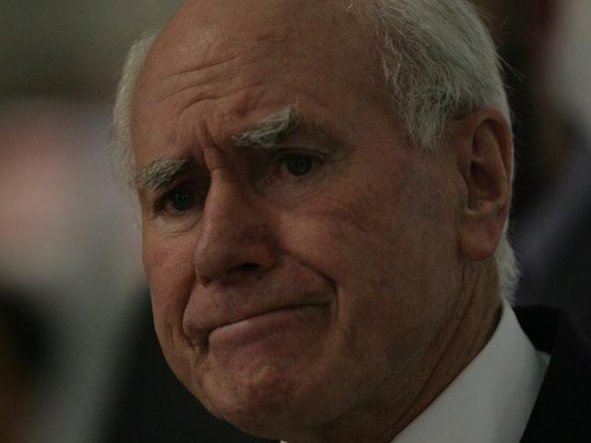 Ex prime minister John Howard promoting the Liberal campaign in Warwick Grove shopping centre in the electorate of Cowan.