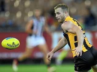 SHERRIN MEET TOM: Hawthorn midfielder Tom Mitchell is quickly redefining the term 'leather poisoning' after another high possession game against Geelong on Easter Monday. Picture: JULIAN SMITH