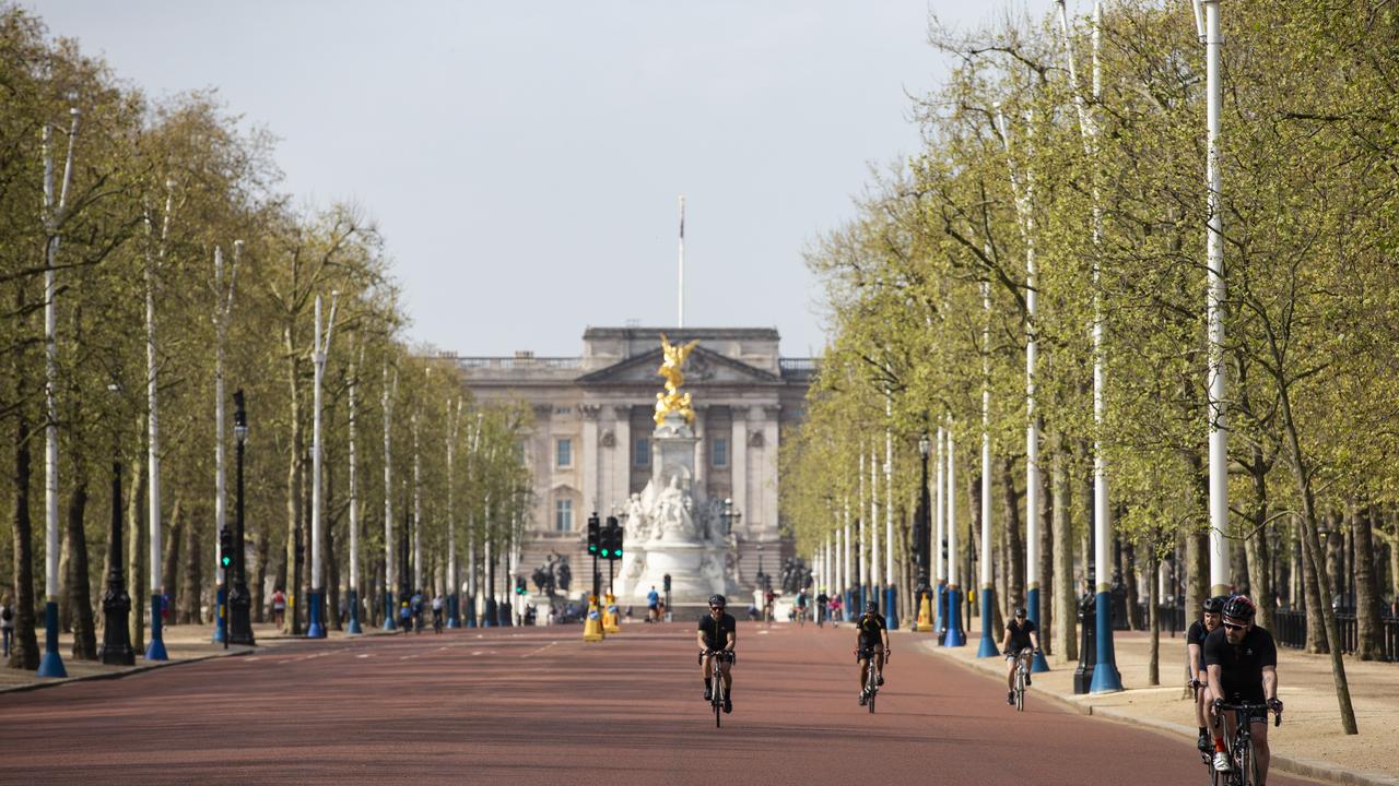 Cyclists ride down The Mall near Buckingham Palace on Easter Sunday in London, England. Picture: Hollie Adams/Getty Images