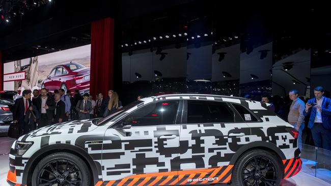 Under cover: The Audi e-Tron is presented during the press day at Geneva. Picture: AP