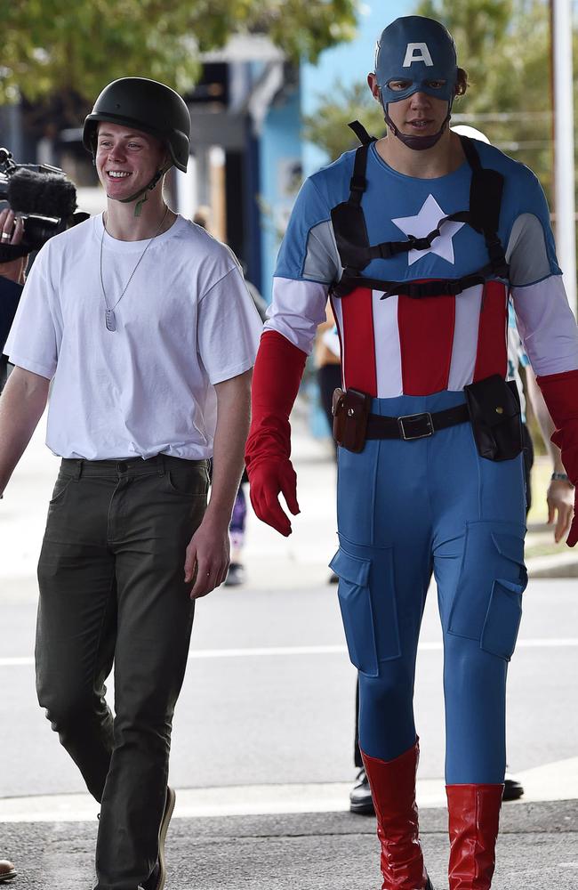 Captain America, before and after … Zach Guthrie and Rhys Stanley get into the spirit of the day. Picture: Alan Barber