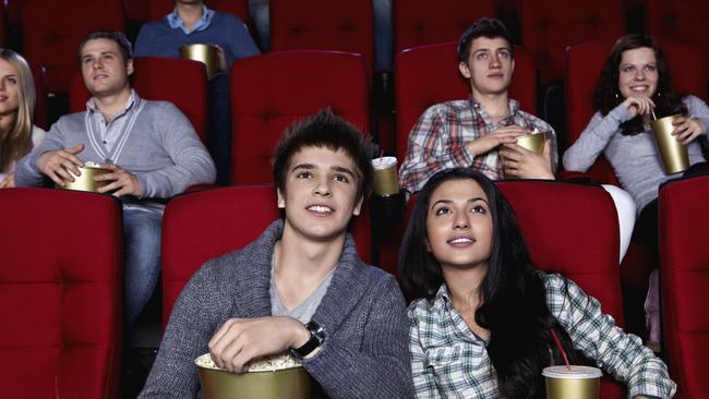 Cinema patrons watching a movie.