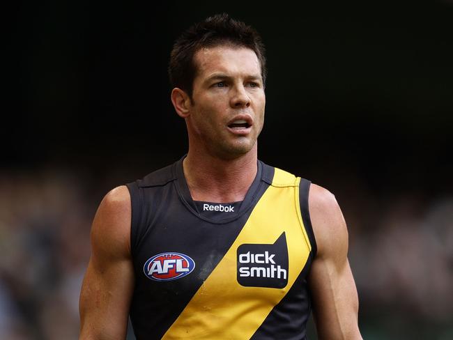 MELBOURNE, AUSTRALIA - AUGUST 29:  Ben Cousins of the Tigers walks the sideline after being substituted during the round 22 AFL match between the Richmond Tigers and the Port Power at Etihad Stadium on August 29, 2010 in Melbourne, Australia.  (Photo by Scott Barbour/Getty Images)