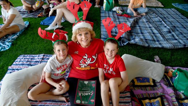 Carols by Candlelight at Riverway 2022. Suzanne Christiansen with Summer, 8, and Lillianna, 10. Picture: Evan Morgan