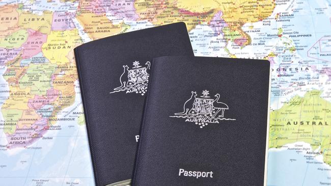 Australian Passport With the World map in the Background