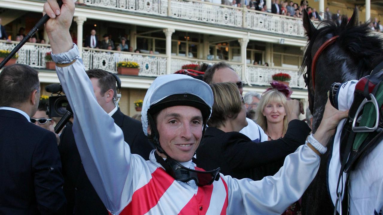 Jockey Dan (Danny) Beasley celebrates after winning Race 7, Queen Elizabeth Stakes on racehorse Grand Armee at Randwick in Sydney.
