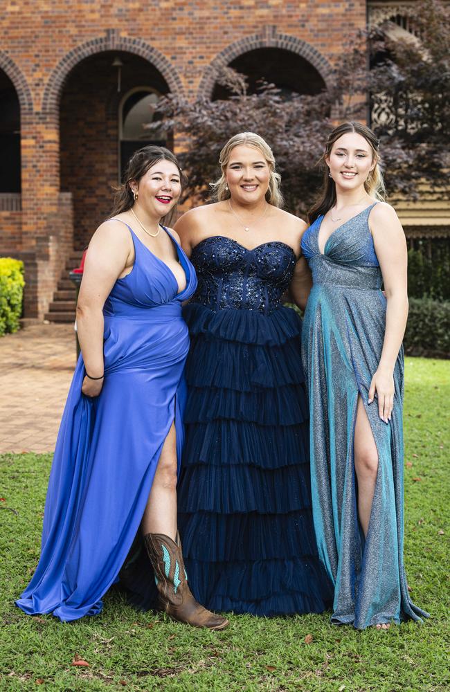 Graduates (from left) Maricka Murphy, Tarlia Pearson and Charlotte Hanson as Downlands College year 12 students come together for their valedictory mass at the college, Saturday, November 16, 2024. Picture: Kevin Farmer