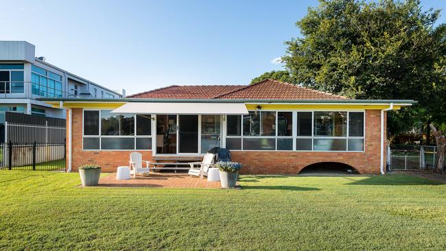 The property at 39 McConnell St, Bulimba, is a modest brick home.