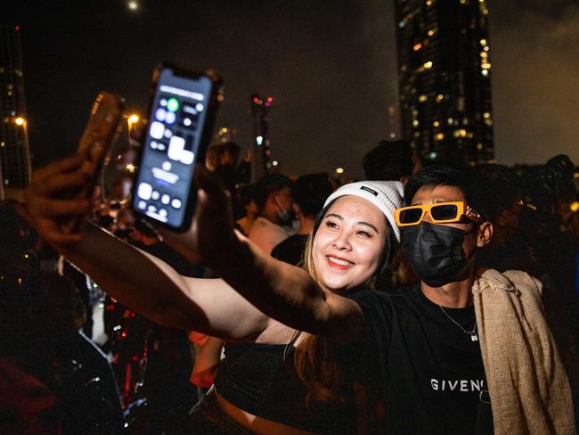 Revellers party in Bangkok. Picture: Getty Images