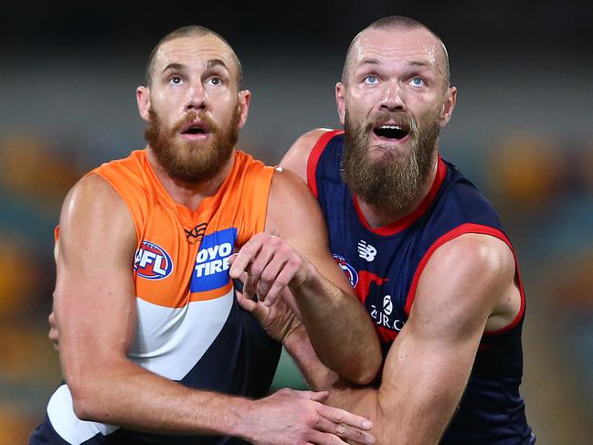 BRISBANE, AUSTRALIA - SEPTEMBER 12: Shane Mumford of the Giants competes with Max Gawn of the Demons during the round 17 AFL match between the Greater Western Sydney Giants and the Melbourne Demons at The Gabba on September 12, 2020 in Brisbane, Australia. (Photo by Jono Searle/AFL Photos/via Getty Images)