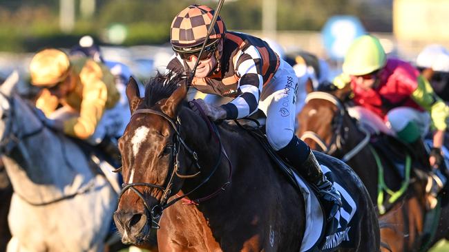 The Annabel Neasham-trained Fawkner Park surges clear to win the Q22 at Eagle Farm in June. Picture: Grant Peters / Trackside Photography