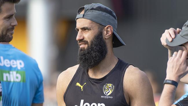 Bachar Houli chats to skipper Trent Ctochin at training