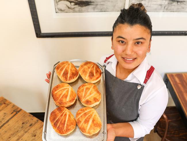 Muna Shrestha and the new season's scallops pies in Battery Point's bakery