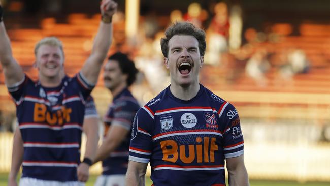 Happy Easts players after making the grand final.