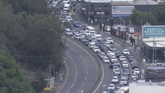 Motorists were confused by a toll road sign after the interchange opened last week, sparking traffic chaos. Picture: 9 News