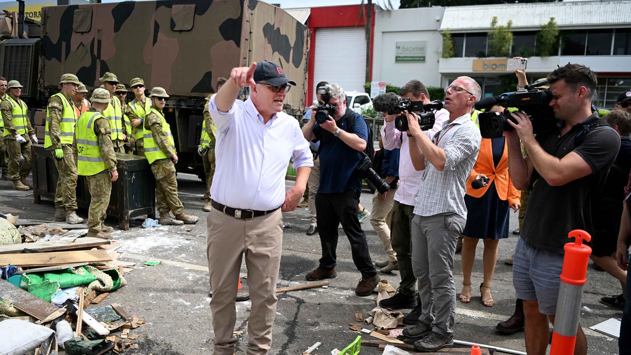 Prime Minister Scott Morrison inspect a flood affected street in Milton, Brisbane. Picture: NCA NewsWire / Dan Peled