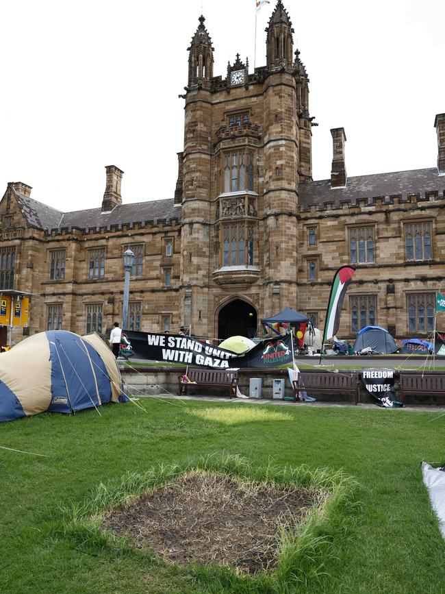 June 17: Marks on the grass show where tents were pitched. Picture: Richard Dobson