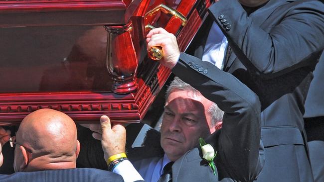 Borce Ristevski carrying the coffin of Karen Ristevski. Picture AAP