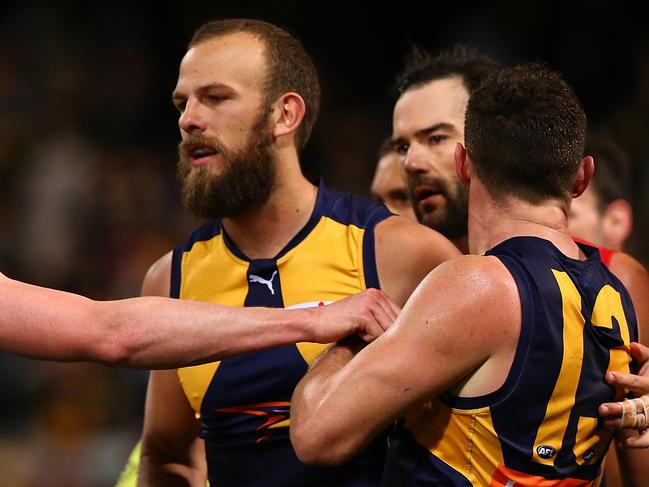 PERTH, AUSTRALIA - JUNE 24: Clayton Oliver of the Demons confronts Will Schofield and Luke Shuey of the Eagles as players become involved in an altercation at the end of the second quarter during the round 14 AFL match between the West Coast Eagles and the Melbourne Demons at Domain Stadium on June 24, 2017 in Perth, Australia.  (Photo by Paul Kane/Getty Images)