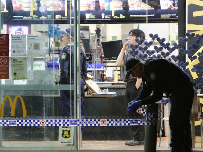 Forensic services set up a crime scene at the restaurant and the police dog unit conducted a sweep of the area. Picture: Bill Hearne