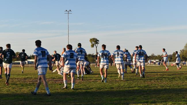 Spectators cheer on as they watch the A Grade Roma vs Condamine match at the Roma Rugby Races at Bassett Park. Picture: Chloe Cufflin.