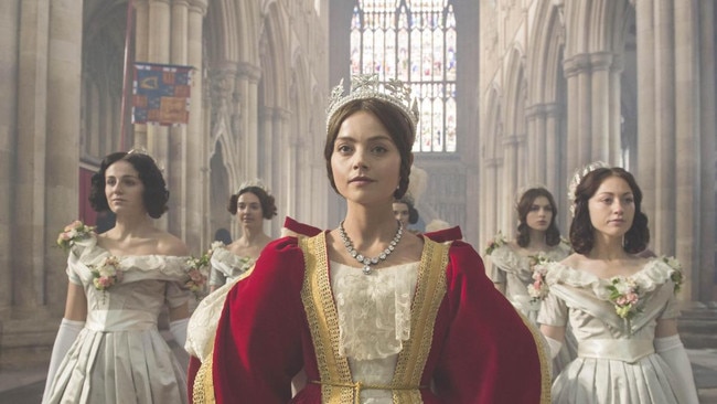 Jenna Coleman in the ITV drama Victoria. In the series, the young Queen Victoria is asked to replace some of her many ladies of the bedchamber — and refuses. Picture: ITV/The Times