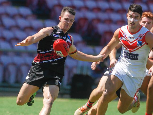 Fletcher Carroll (ball) as NTFL Round 5 progresses with The  Tiwi Bombers v Waratahs.Picture GLENN CAMPBELL