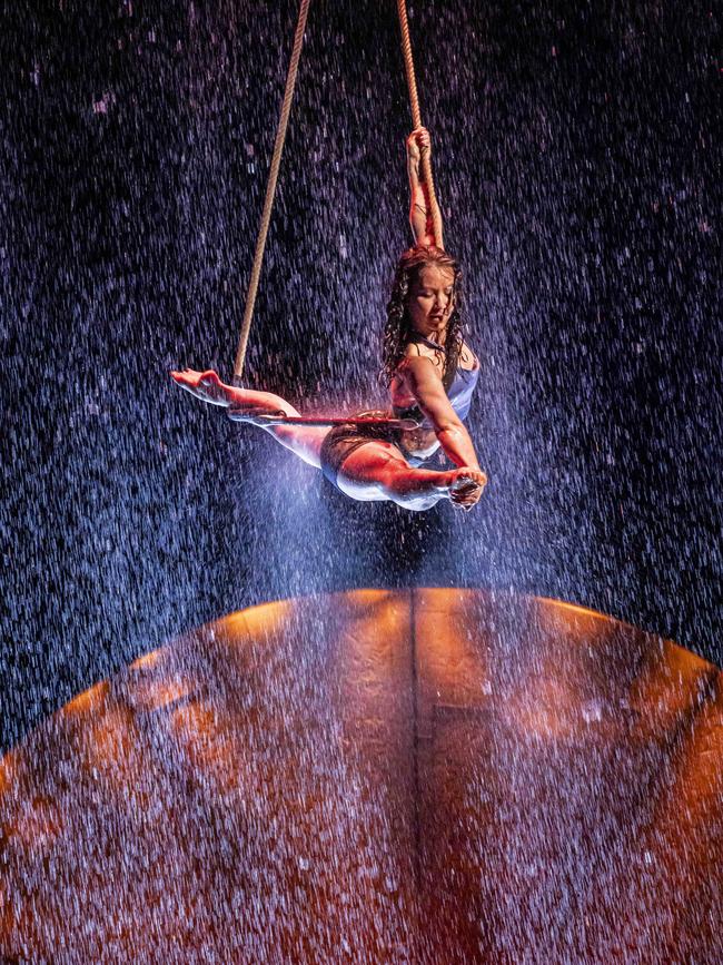 A “rain curtain” in the ceiling of Cirque du Soleil’s Big Top sends 100,000 litres of water on to the stage. Picture: Wayne Taylor