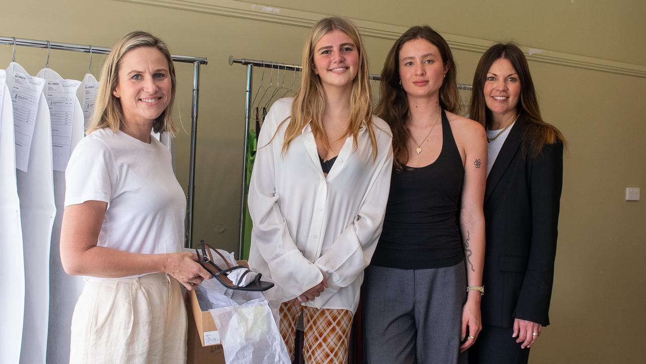 Left: CEO Wittner Shoes, of Melbourne, Catherine Williamson, Bec + Bridge staff Zariah Fairburn and Lenna Durieux with CEO Bec + Bridge Natice Myers, at the Lismore Showgrounds on 27 October as part of a convoy to donate glam and bling to make class of 2022's final hurrah a grand one after historic floods pummelled the region in February and March.