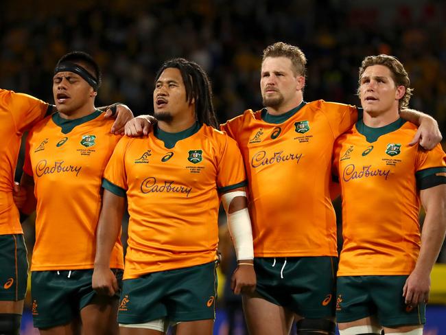 BRISBANE, AUSTRALIA - JULY 17: Lukhan Salakaia-Loto of the Wallabies, Allan Alaalatoa of the Wallabies, Brandon Paenga-Amosa of the Wallabies, James Slipper of the Wallabies and Michael Hooper of the Wallabies during the national anthem during the International Test Match between the Australian Wallabies and France at Suncorp Stadium on July 17, 2021 in Brisbane, Australia. (Photo by Kelly Defina/Getty Images)