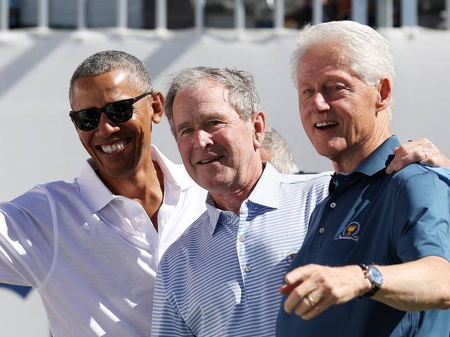 Former Presidents Obama, Bush and Clinton together at a golf day in Jersey City in 2017. Picture: Getty