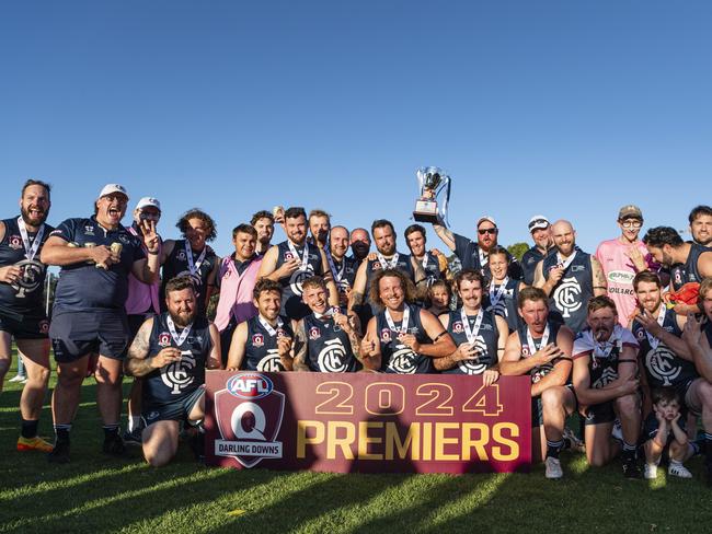 Coolaroo celebrate defeating Goondiwindi Hawks in AFL Darling Downs Allied Cup senior men grand final at Rockville Park, Saturday, August 31, 2024. Picture: Kevin Farmer