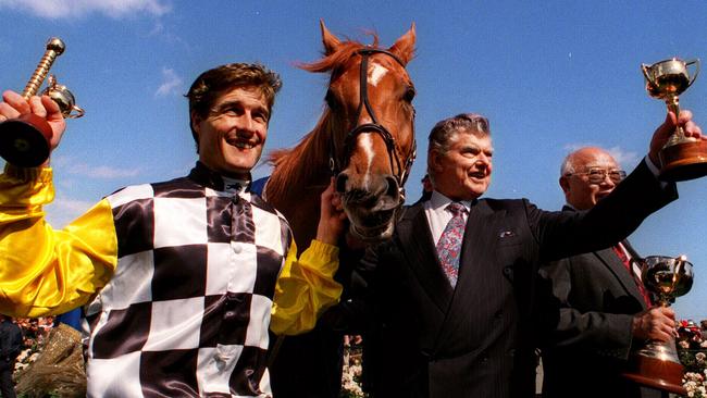 Jockey Darren Beadman (left) with Saintly and Bart Cummings after the 1996 Melbourne Cup.