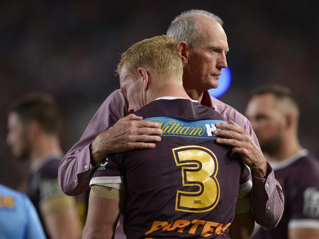 SYDNEY, AUSTRALIA – OCTOBER 04: Wayne Bennett, Coach of the Broncos hugs Jack Reed after defeat during the 2015 NRL Grand Final match between the Brisbane Broncos and the North Queensland Cowboys at ANZ Stadium on October 4, 2015 in Sydney, Australia. (Photo by Brett Hemmings/Getty Images)