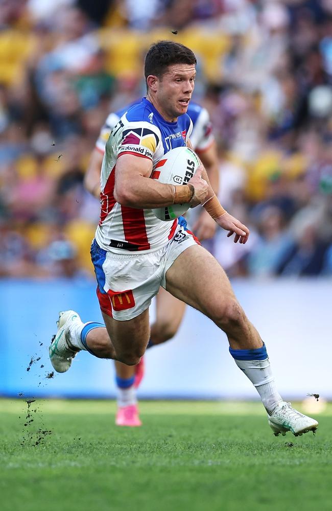 Jack Cogger of the Knights makes a break. (Photo by Hannah Peters/Getty Images)