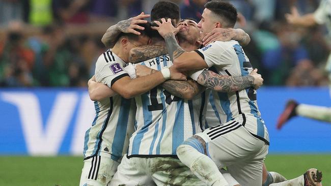 Argentina' players celebrate their penalty shootout win.