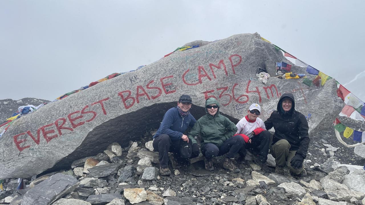 After discovering he would lose vision by his 20s, Mitchell Wilkes, with his parents, Lisa and Melanie Wilkes, and older sister embarked on a bucket list journey to see the world including climbing to Everest Base Camp, the Larapinta Trail, and skydiving. Picture: Supplied