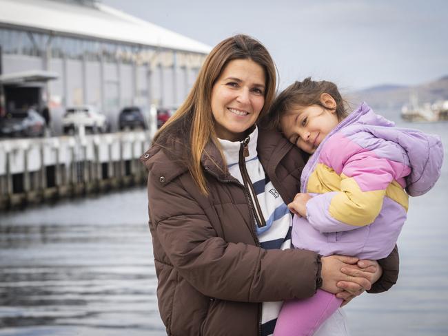 Patricia Dyer and four-year-old daughter Ella have arrived to a freezing Hobart from Sydney. Picture: Chris Kidd