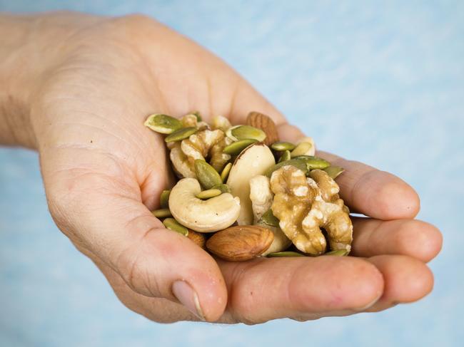 And eating two handfuls of nuts per day may enhance male fertility, research as found.