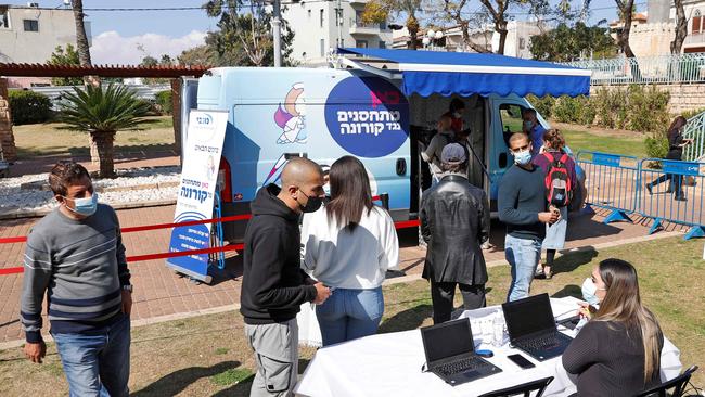 People queue to get vaccinated at the Maccabi Health vaccination centre in the Israeli coastal city of Tel Aviv. Israel has been a global leader in administering COVID-19 vaccinations. Picture: AFP