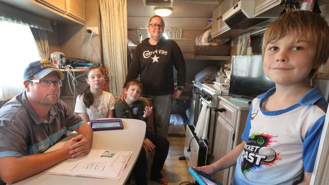 The Smith family, Justin, Zoe-Anne, and their three children, Izabella, 11, Jaxson, 10, and Jai, 9, have been living in a caravan for the past five months, victims of the current rental crisis. Picture: Dean Martin