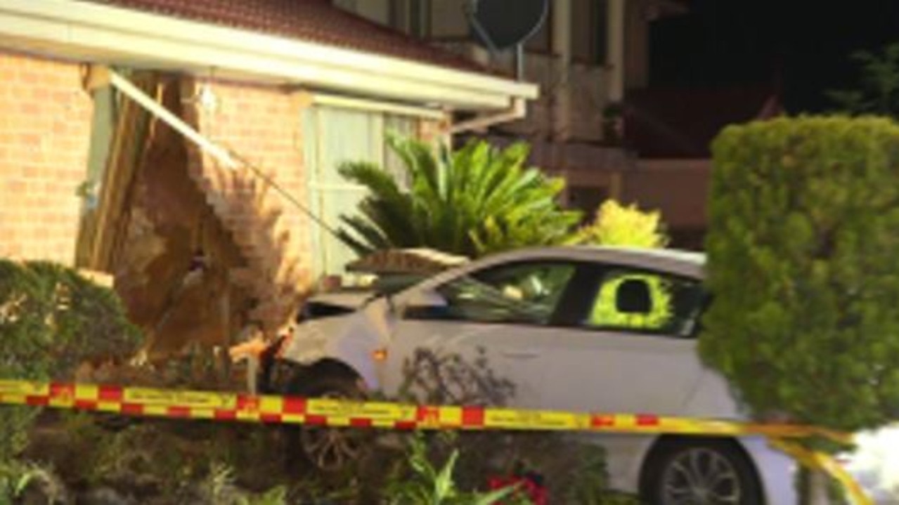 Family’s miracle escape after car crashes through Sydney house