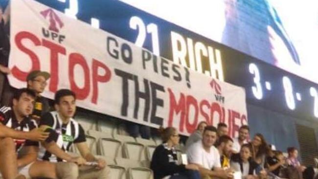 The banner held up against the scoreboard at the Collingwood v Tigers game.