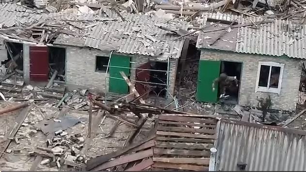 Soldiers can be seen throwing grenades into the homes. Picture: Supplied