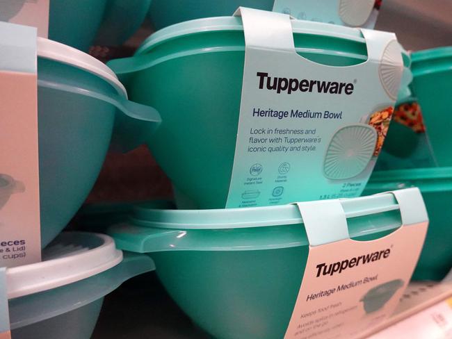 (FILES) Tupperware products are offered for sale at a retail store on April 10, 2023 in Chicago, Illinois. Tupperware Brands Inc and some of its subsidiaries filed for Chapter 11 bankruptcy protection on September 17, 2024, the food container firm said in a statement. The company, known for its trademark food storage containers, has been hit by dwindling sales in recent years. (Photo by SCOTT OLSON / GETTY IMAGES NORTH AMERICA / AFP)