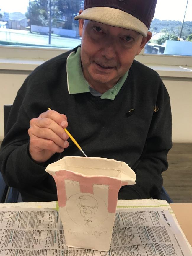 Brett Ferguson, of Frenchs Forest, making a KFC takeaway box which is on display at Warringah Mall Library. Picture: Supplied.