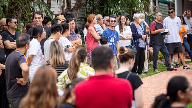 A crowd of bidders was seen at the auction for a home Schumack St in North Ryde last week. Picture: Julian Andrews