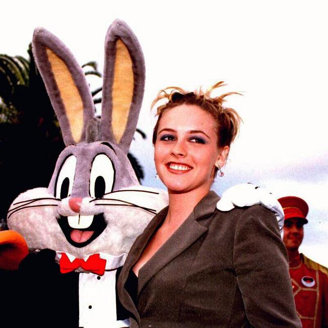 Actor Alicia Silverstone with cartoon character Bugs Bunny